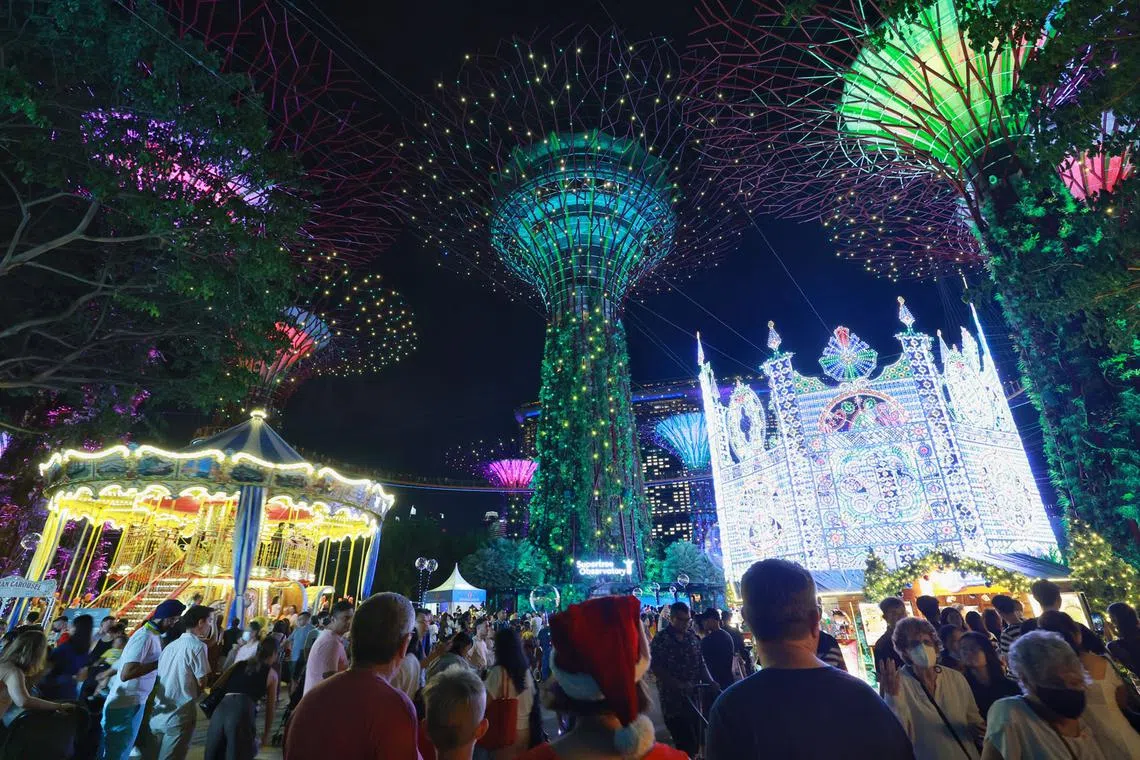 The ninth edition of Christmas Wonderland features a double-storey carousel (left) and a 21m-tall Spalliera light installation (right) with 103,000 light bulbs, DEC 3, 2022.