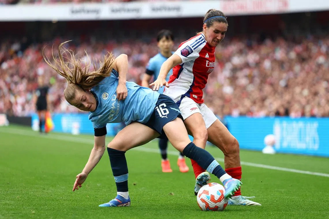 Manchester City's Jessica Park in action with Arsenal's Mariona Caldentey in a Women's Super League match on Sept 22.