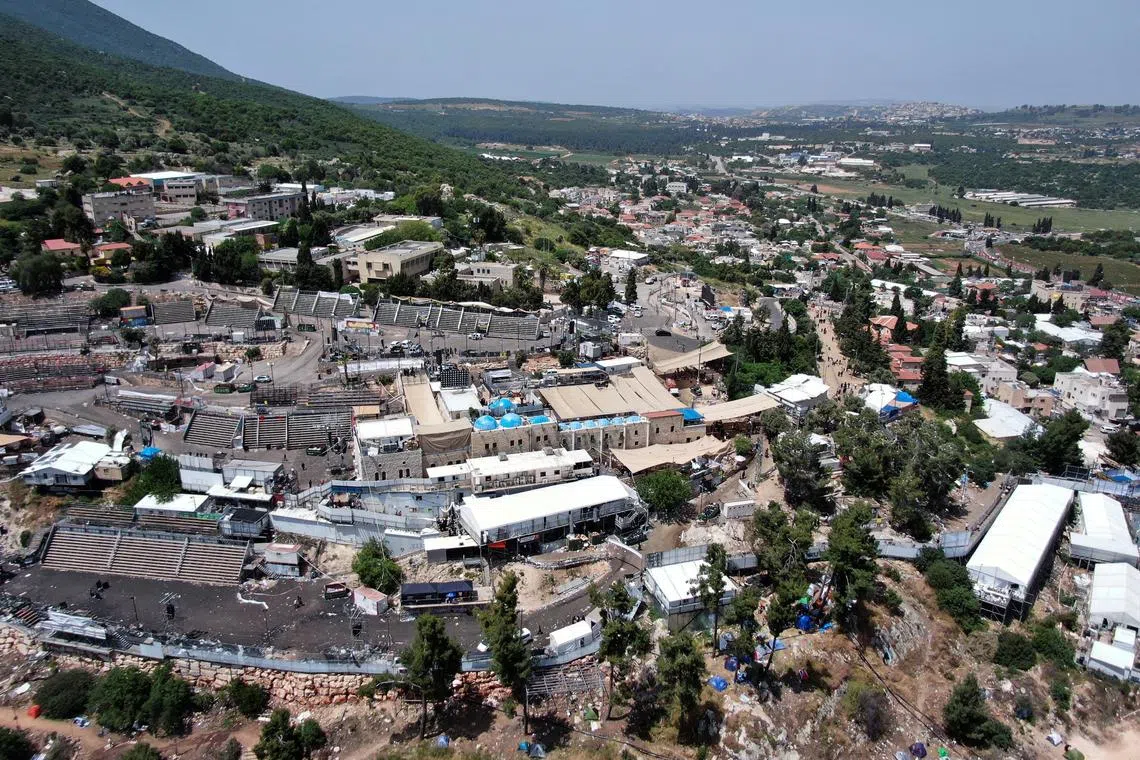 FILE PHOTO: A view of Mount Meron where fatalities were reported among the thousands of ultra-Orthodox Jews, who gathered at the tomb of a 2nd-century sage for annual commemorations that include all-night prayer and dance, Israel April 30, 2021. REUTERS/Ilan Rosenberg/File Photo