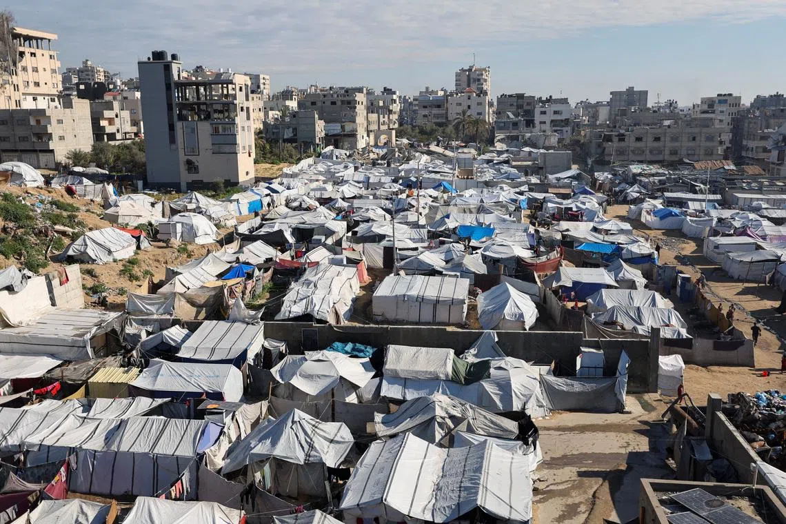 Palestinians displaced during the two-year Israeli offensive, shelter at a tent camp in Gaza City, March 1, 2026. REUTERS/Dawoud Abu Alkas