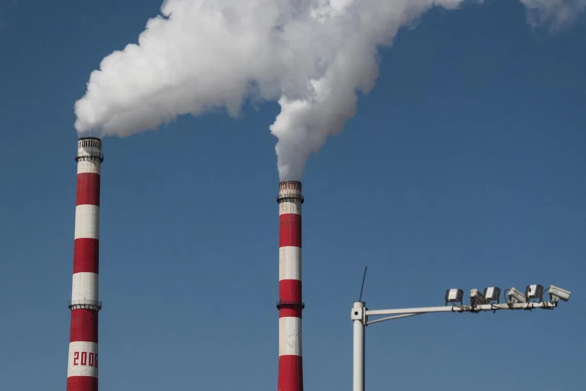 Chimneys of Baotou East Hope coal power station emit smoke in China’s rare earth industry hub city Baotou, Inner Mongolia, China, on April 6.