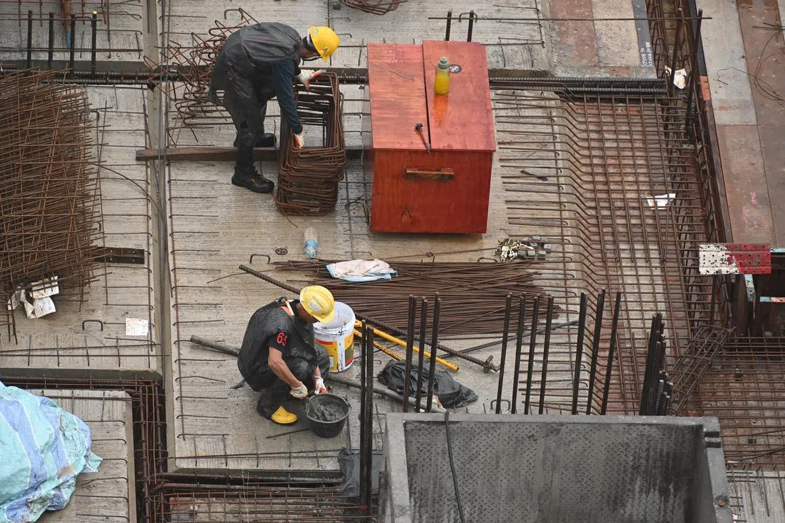 Some construction workers may be working harder during cooler periods, NUS researchers found.