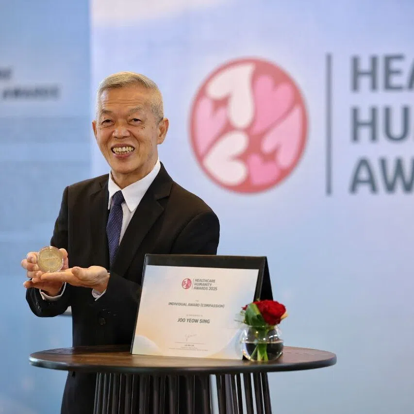 Mr Joo Yeow Sing with his individual award for compassion during the Healthcare Humanity Awards at Clifford Pier, on Nov 6.