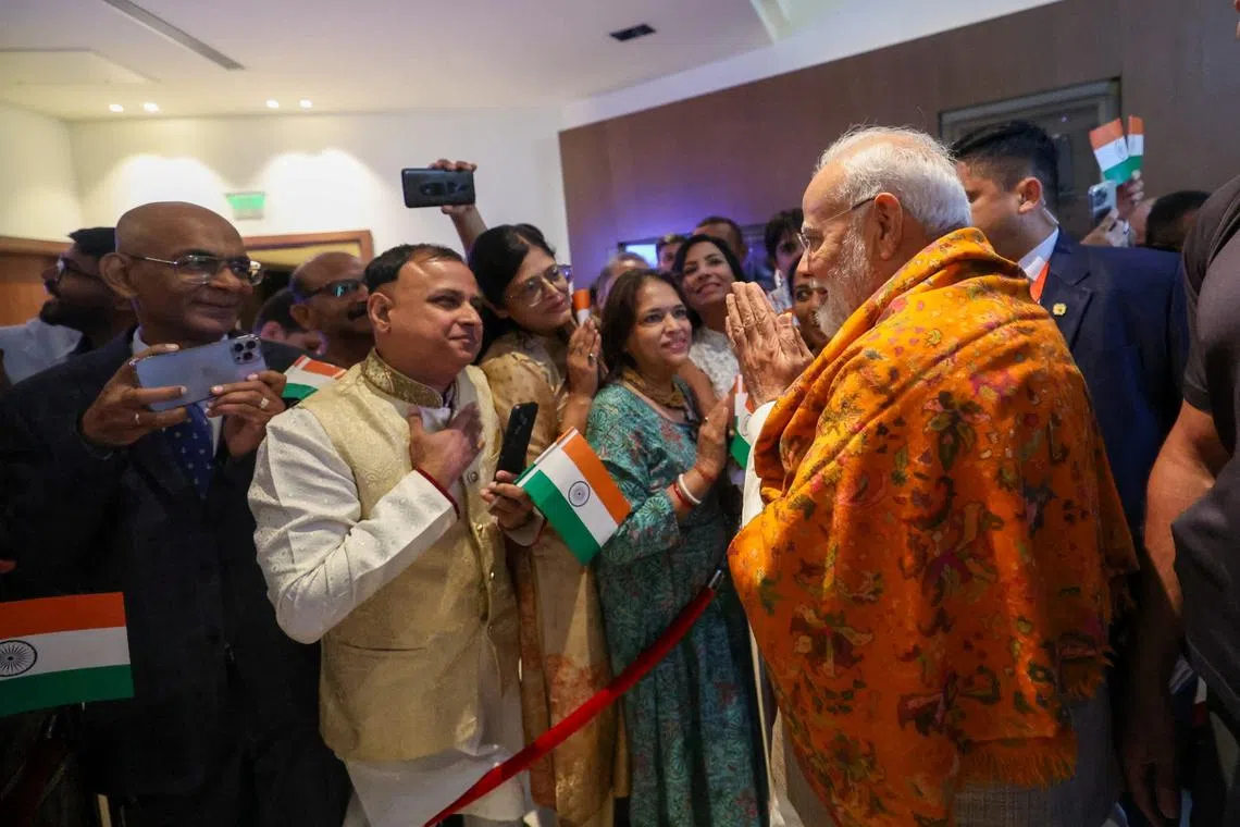 India's Prime Minister Narendra Modi is greeted by members of the Indian community as he visits Kyiv, Ukraine, August 23, 2024, in this picture obtained from social media. Narendra Modi via X/Handout via REUTERS