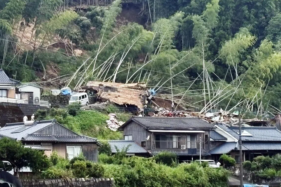 A house is seen destroyed by a landslide in Aira, Kagoshima prefecture, south-western Japan.