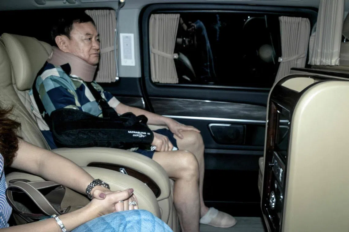 Thailand's former prime minister Thaksin Shinawatra arrives at his family residence after he was released from a police hospital in Bangkok on Feb 18, 2024..