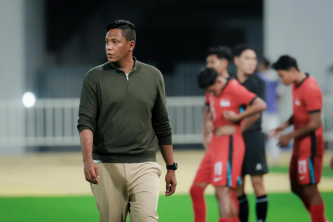 Singapore men?s under-22 football head coach Firdaus Kassim and his players reacting after the final whistle during the group match at the Rajamangala National Stadium during the Thailand Southeast Asian Games in Bangkok on Dec 6, 2025.
