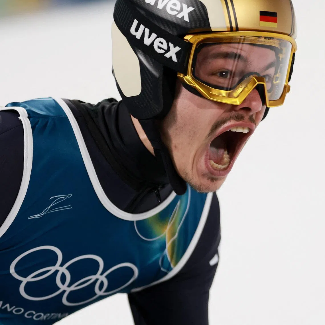 Milano Cortina 2026 Olympics - Ski Jumping - Men's Normal Hill Individual - Final Round - Predazzo Ski Jumping Stadium, Predazzo, Italy - February 09, 2026. Philipp Raimund of Germany reacts after performing. REUTERS/Stephanie Lecocq