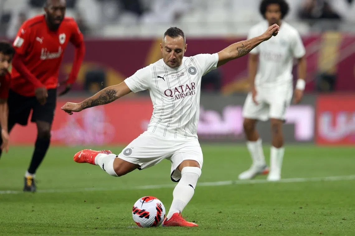 Soccer Football - Emir Cup - Final - Al Sadd v Al Rayyan - Al Thumama Stadium, Al Thumama, Qatar - October 22, 2021 Al Sadd's Santi Cazorla scores their first goal from the penalty spot REUTERS/Ibraheem Al Omari