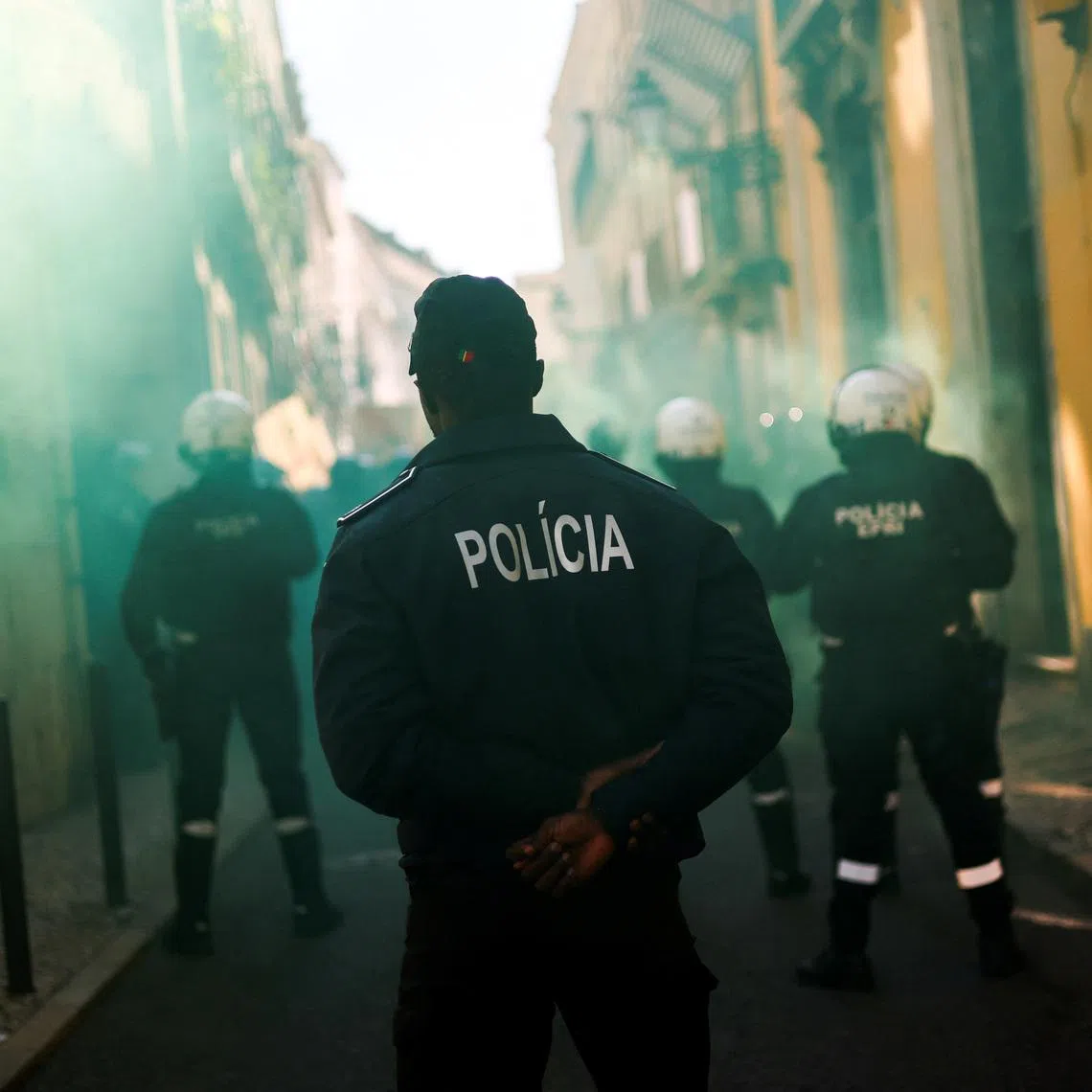 FILE PHOTO: Police officers stand guard during a protest in Lisbon, Portugal, November 24, 2023. REUTERS/Pedro Nunes/File Photo
