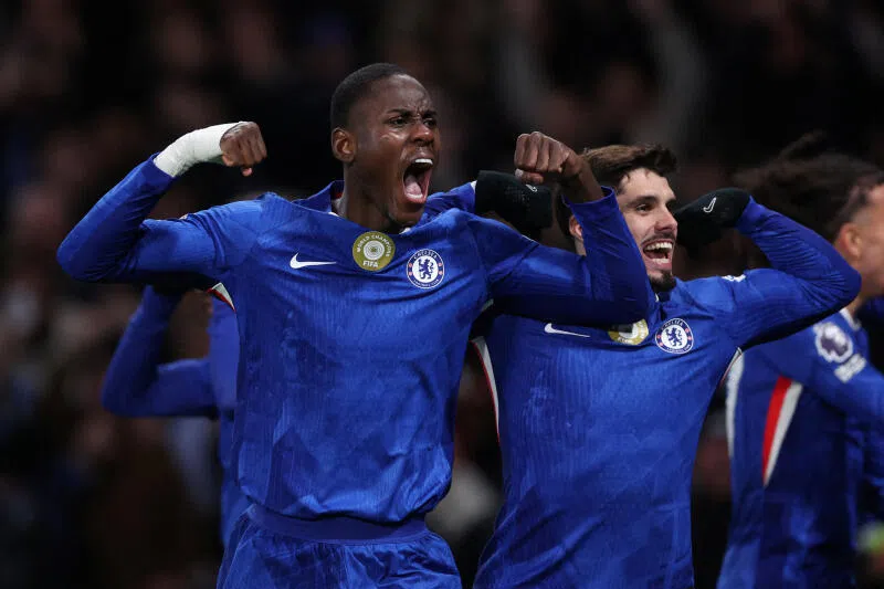 Chelsea's Trevoh Chalobah celebrates scoring their first goal with Pedro Neto.