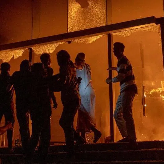 The Daily Star building in Dhaka aflame on Dec 19 as the death of a young activist leader sets off a political conflagration ahead of elections in February.