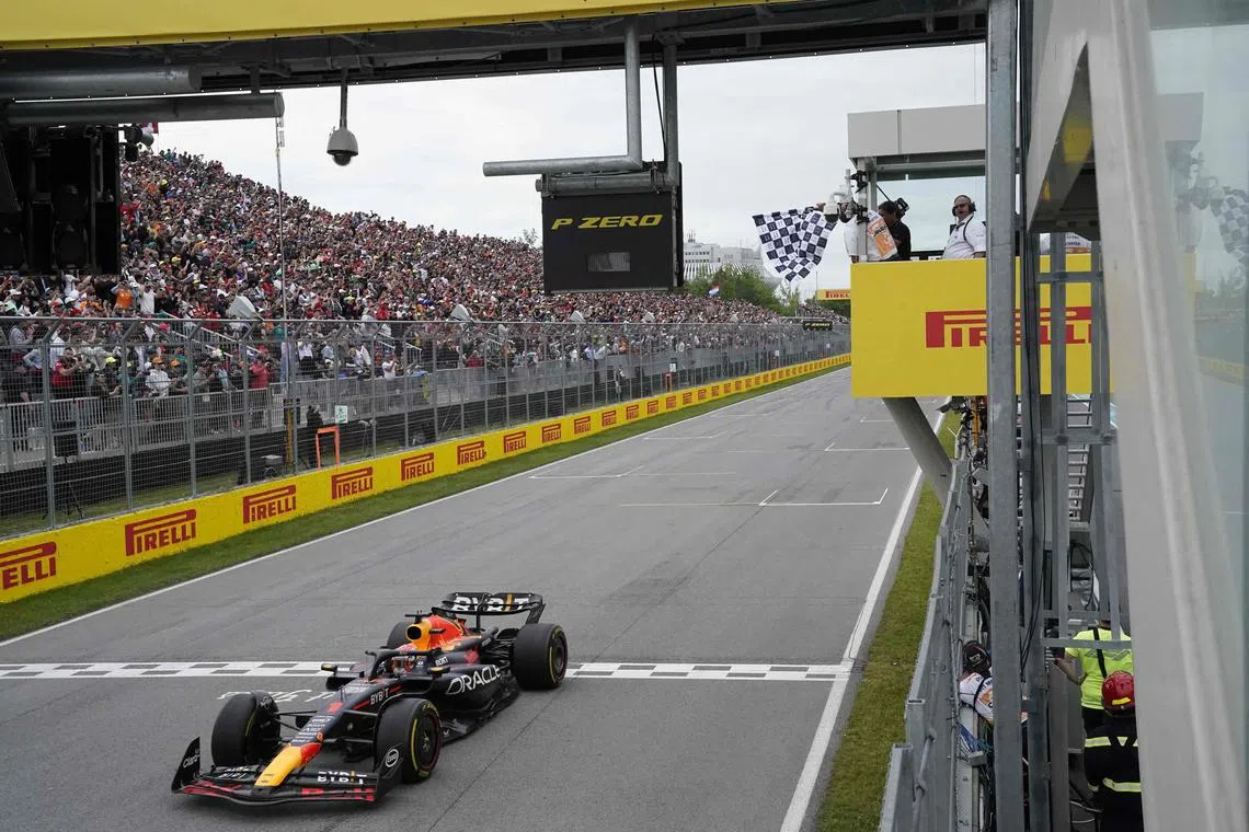 Red Bull's Max Verstappen crosses the finish line to win the Canadian Grand Prix.