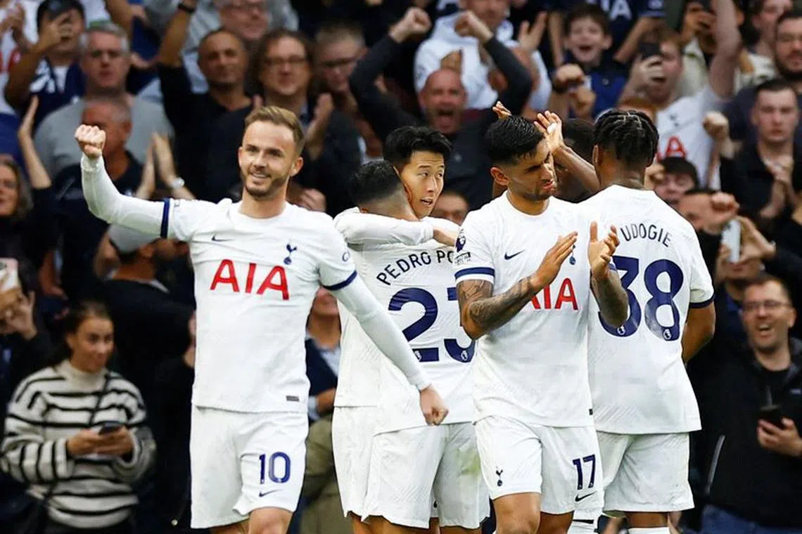 FILE PHOTO: Soccer Football - Premier League - Tottenham Hotspur v Liverpool - Tottenham Hotspur Stadium, London, Britain - September 30, 2023 Tottenham Hotspur's Son Heung-min celebrates scoring their first goal with James Maddison, Pedro Porro, Cristian Romero and Destiny Udogie Action Images via Reuters/Peter Cziborra/File Photo