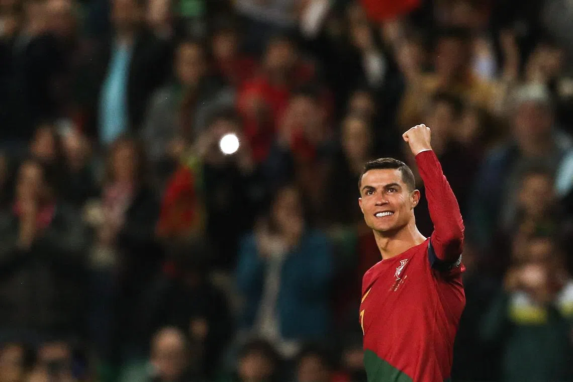 Portugal's forward Cristiano Ronaldo celebrates scoring his team's third goal against Liechtenstein.