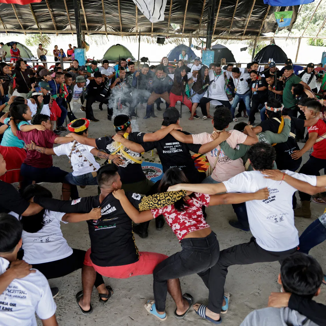 Indigenous guards participate in a recreational activity during a meeting of guards from communities across the region, who aim to defend the natural resources of the Amazon from exploitation, in Sinangoe, Ecuador, December 3, 2025. REUTERS/Karen Toro