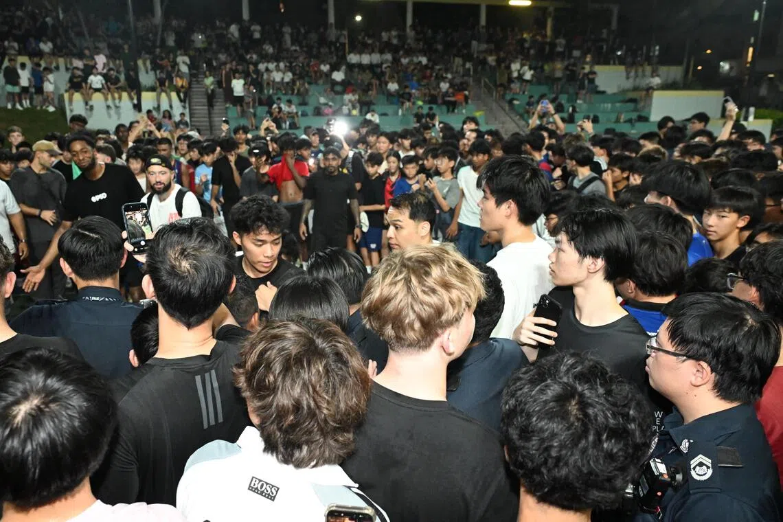 Police arrive at the basketball court at 6 Lorong Liew Lian where Canadian basketball influencer Matt Kiatipis is playing on Oct 7, 2026. 

ST PHOTO: AZMI ATHNI
