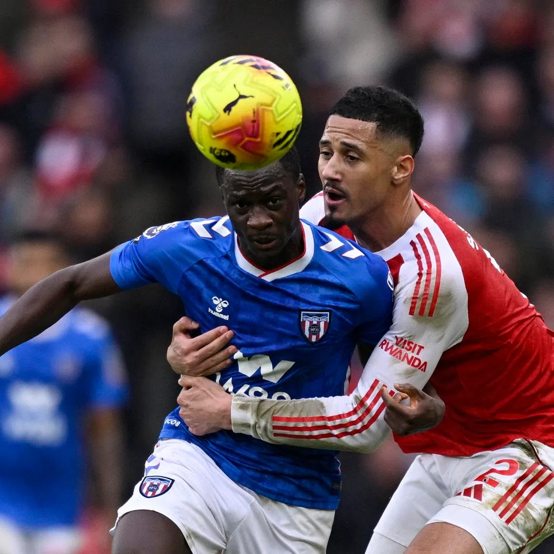 Soccer Football - Premier League - Arsenal v Sunderland - Emirates Stadium, London, Britain - February 7, 2026 Arsenal's William Saliba in action with Sunderland's Habib Diarra REUTERS/Tony O Brien