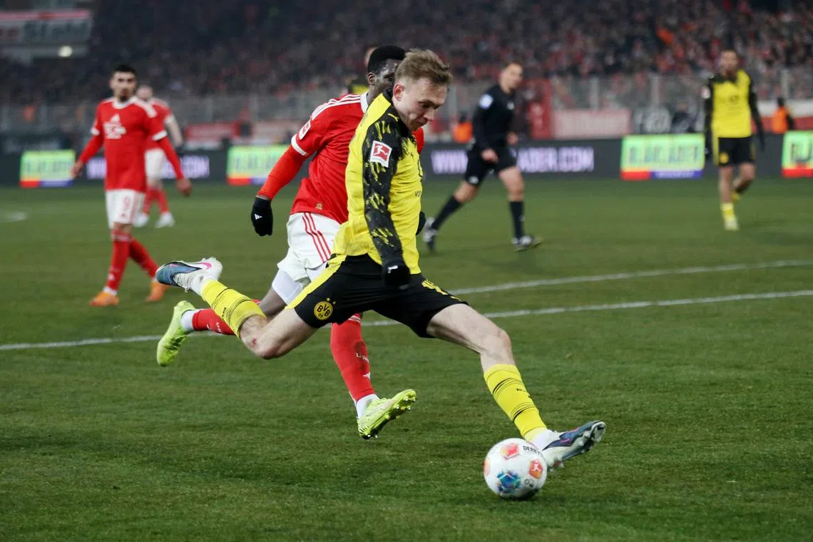 Soccer Football - Bundesliga - 1. FC Union Berlin v Borussia Dortmund - Stadion An der Alten Forsterei, Berlin, Germany - January 24, 2026 Borussia Dortmund's Maximilian Beier scores their third goal REUTERS/Maryam Majd