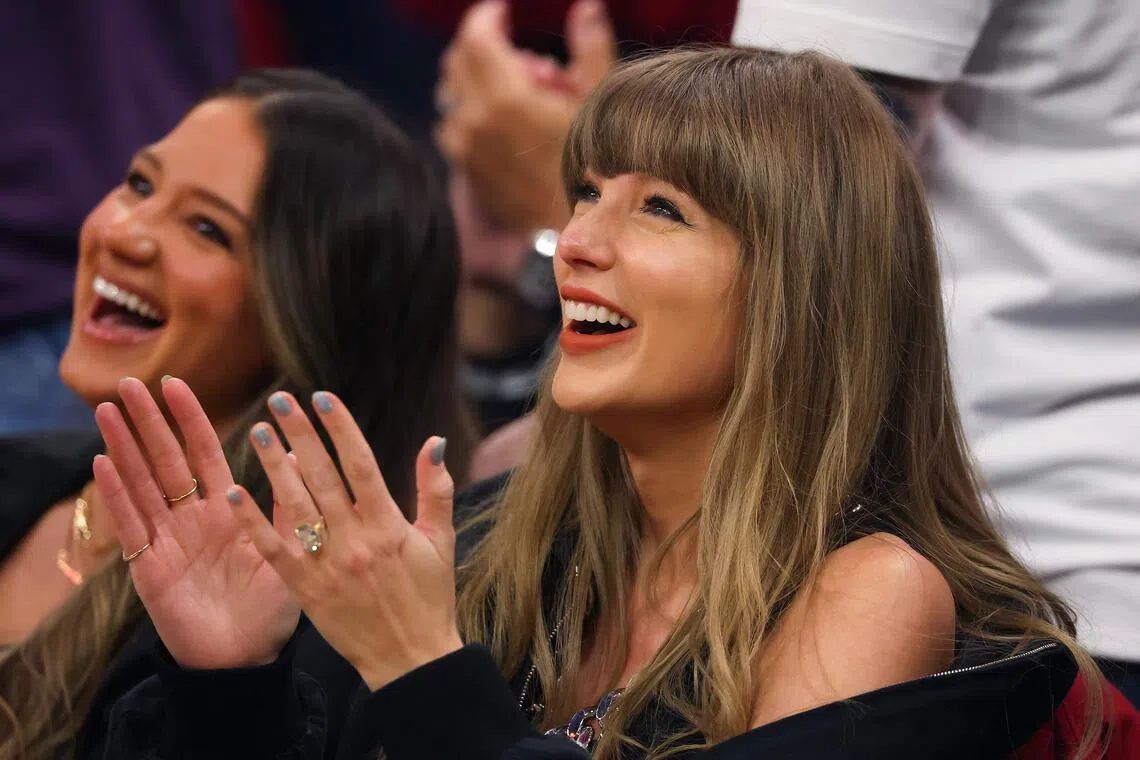 Taylor Swift appears at Knicks game with Haim sisters