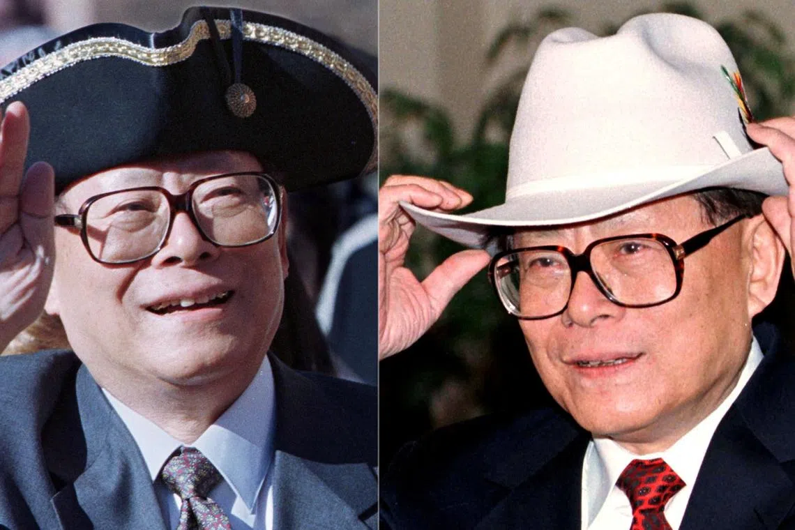  (L-R): Wearing different hats - Chinese President Jiang Zemin waves as he wears an 18th-century American colonial tricorn hat during a tour of Colonial Williamsburg, Virginia, U.S., Oct 28, 1997 and trying on a new cowboy hat given to him by Calgary Mayor Al Duerr in Calgary, Canada, on Nov 26, 1997. 