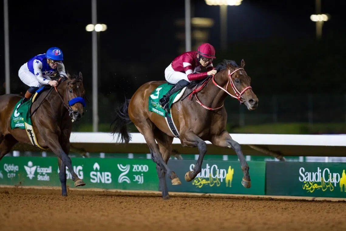 Japan’s Forever Young (Ryusei Sakai) striding away from the US-trained Nysos (Flavien Prat) on his way to a second Group 1 Saudi Cup (1,800m) success at King Abdulaziz racecourse on Feb 14, 2026. 