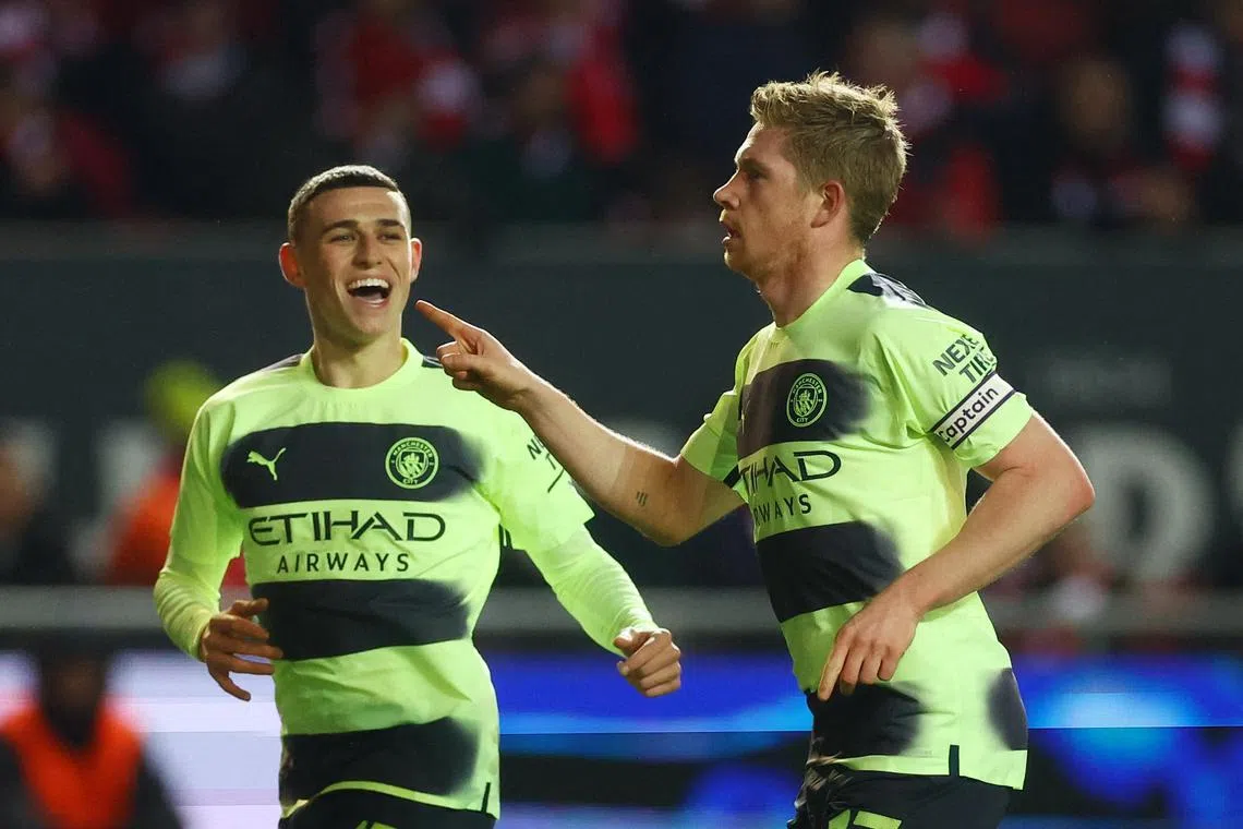 Manchester City's Kevin De Bruyne (right) celebrates scoring their third goal with Phil Foden, who earlier scored twice.