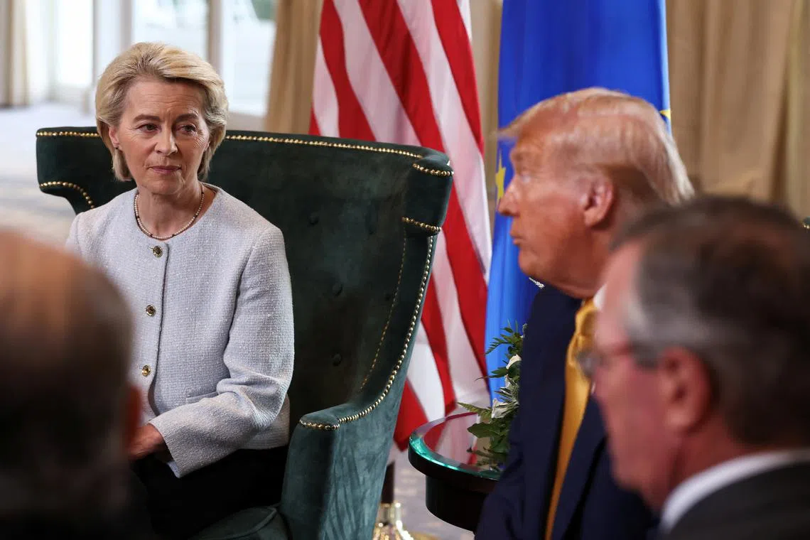 European Commission President Ursula von der Leyen sits with U.S. President Donald Trump, after the announcement of a trade deal between the U.S. and EU, in Turnberry, Scotland, Britain, July 27, 2025. REUTERS/Evelyn Hockstein