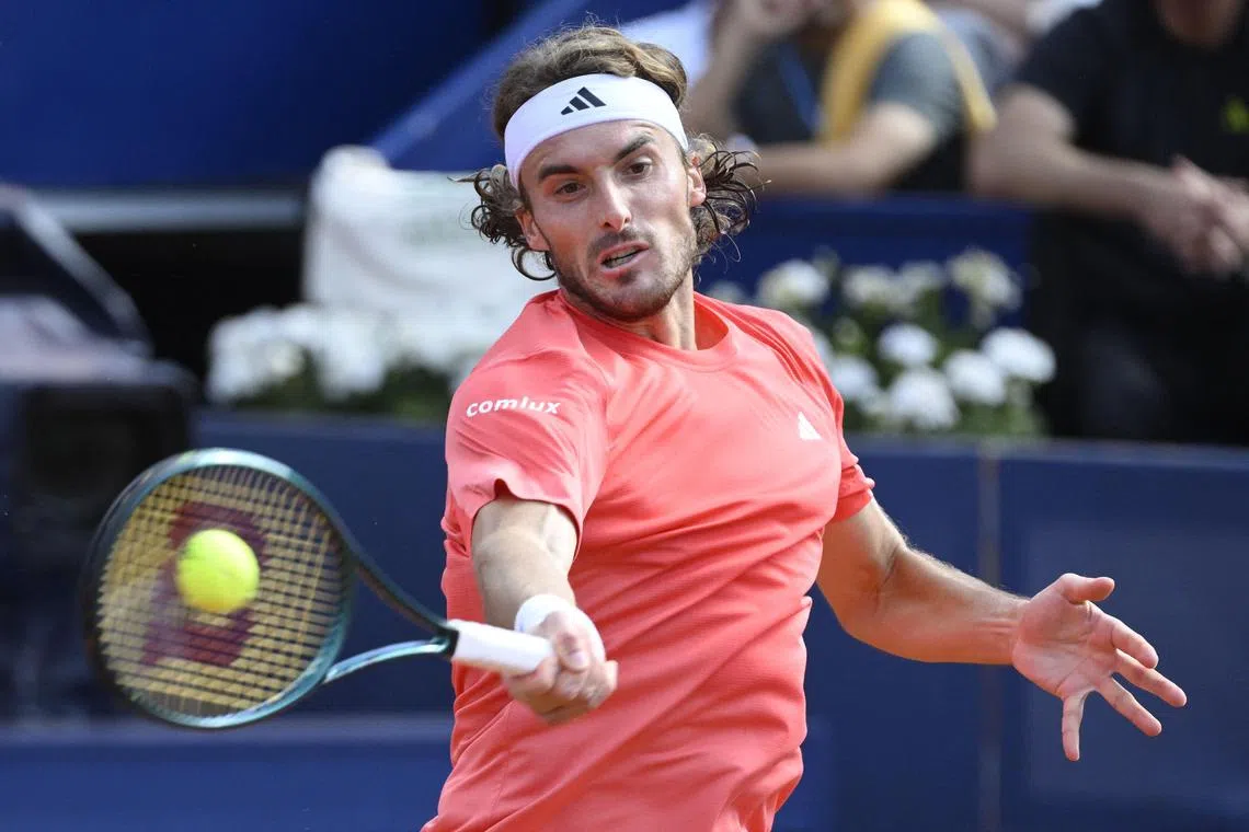 Greece's Stefanos Tsitsipas in action against Serbia's Dusan Lajovic.