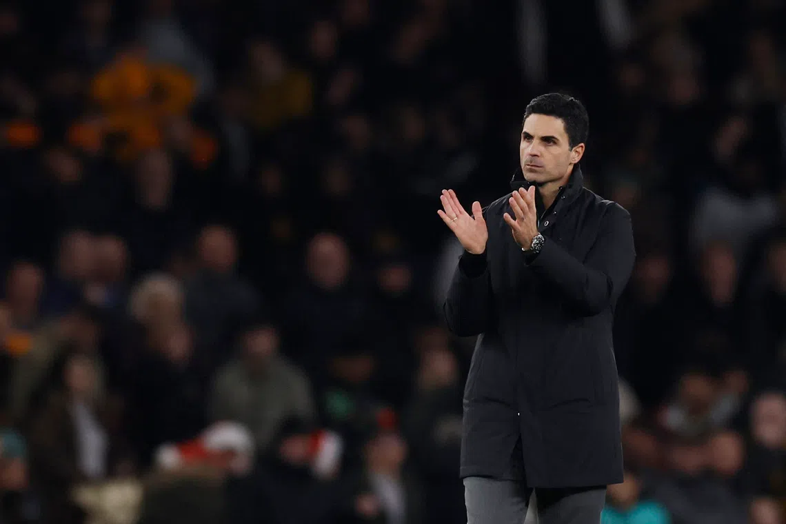 Soccer Football - Premier League - Arsenal v Wolverhampton Wanderers - Emirates Stadium, London, Britain - December 13, 2025 Arsenal manager Mikel Arteta celebrates after the match Action Images via Reuters/Andrew Couldridge