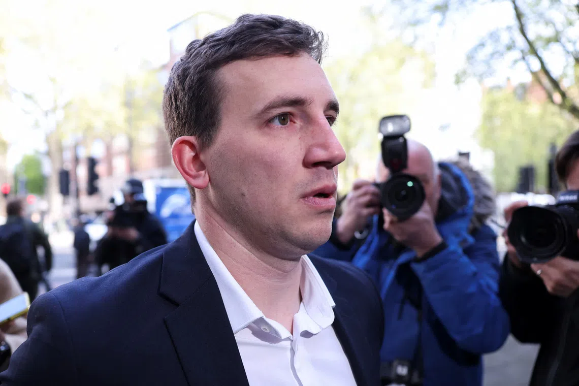 Christopher Cash, 29, who has been charged with spying for China, arrives at Westminster Magistrates' Court, in London, Britain, April 26, 2024. REUTERS/Hollie Adams