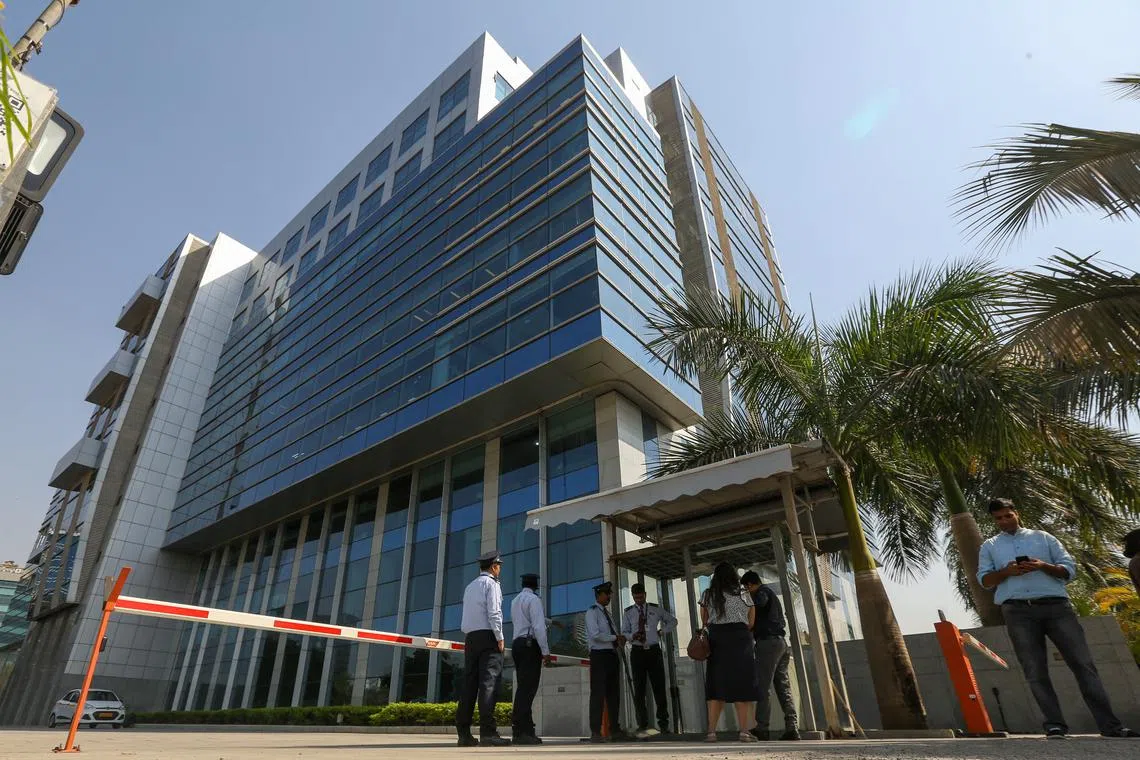 Security personnel stand guard outside the BBC office in Mumbai on Feb 14, 2023.