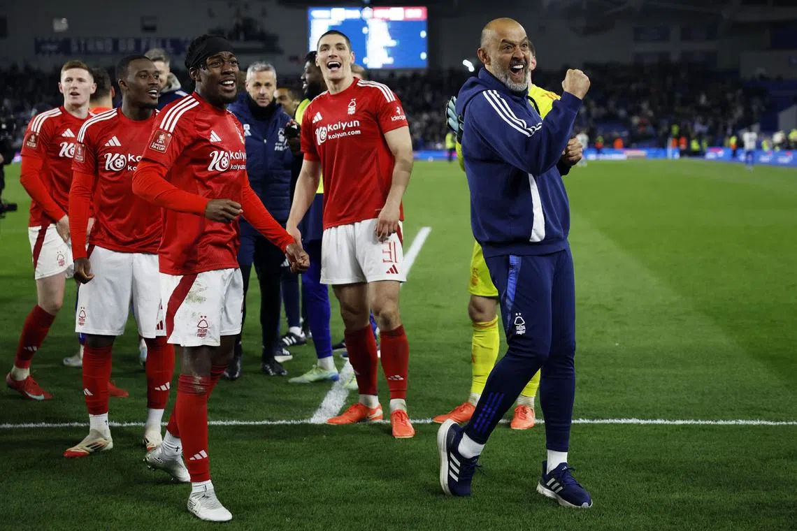 Soccer Football - FA Cup - Quarter Final - Brighton & Hove Albion v Nottingham Forest - The American Express Community Stadium, Brighton, Britain - March 29, 2025
Nottingham Forest manager Nuno Espirito Santo celebrates after the match Action Images via Reuters/Peter Cziborra