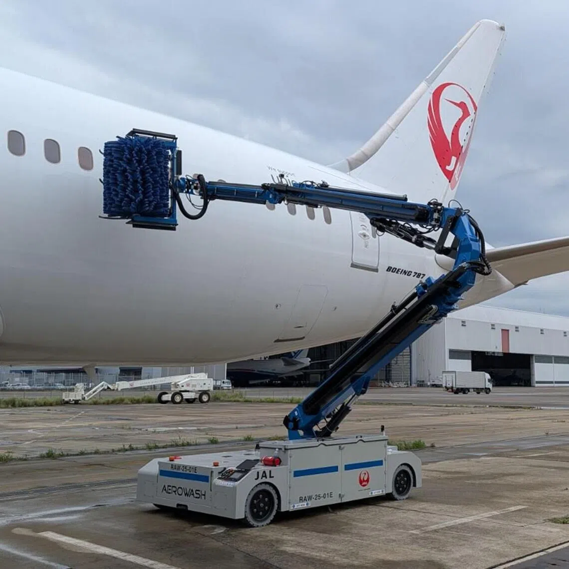 The AW3 robot can clean an aircraft using a remotely-operated telescopic arm and will start full-scale operation later in 2026.