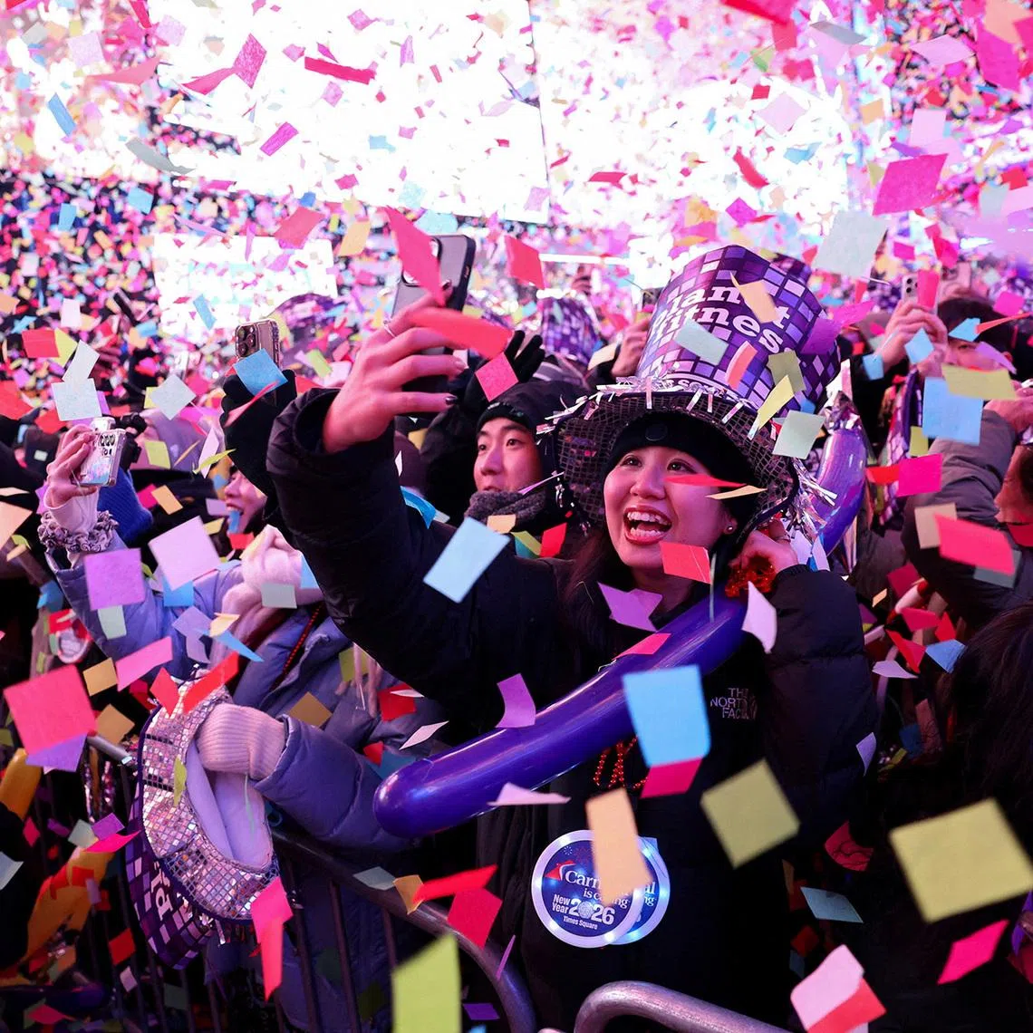 People celebrating the New Year at Times Square in New York City on Jan 1, 2026. 