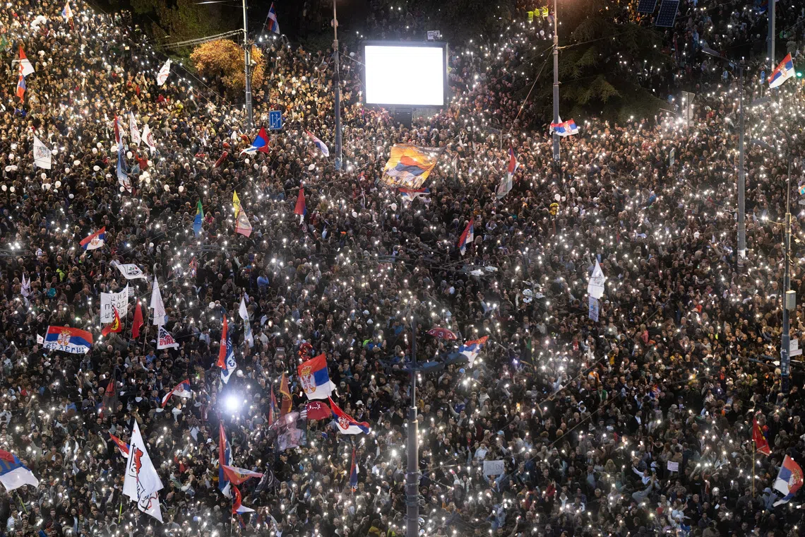 Supporters of the electoral list “Student List - Students Win” attend a final campaign rally at Slavija Square in Belgrade, Serbia, on Oct 22.