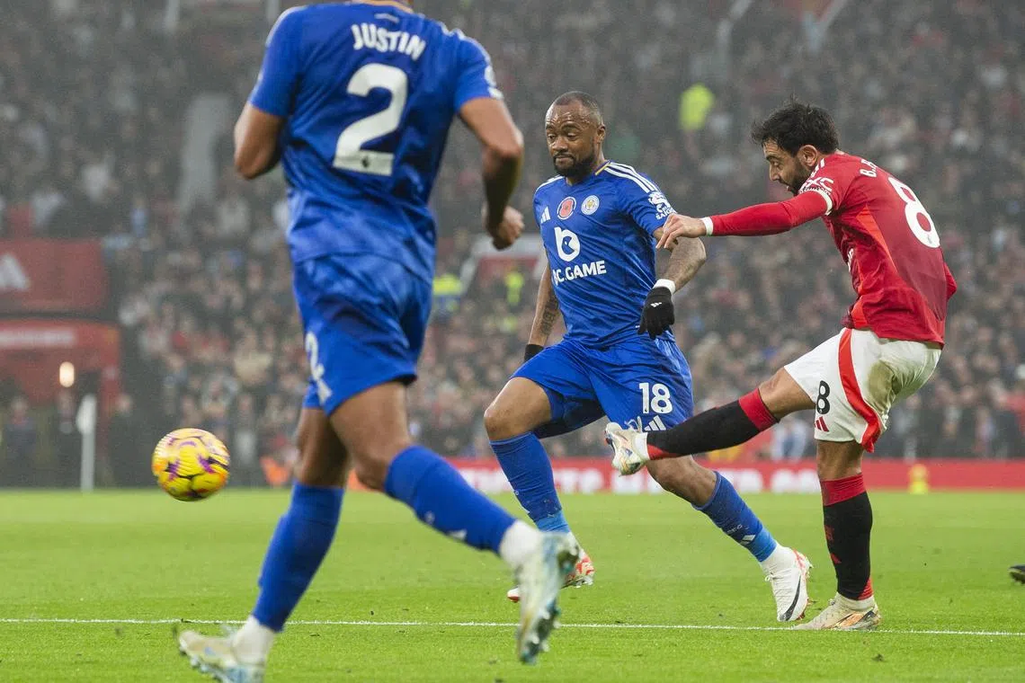 Bruno Fernandes of Manchester United scoring the opening goal during the English Premier League match against Leicester City at Old Trafford on Nov 10. 