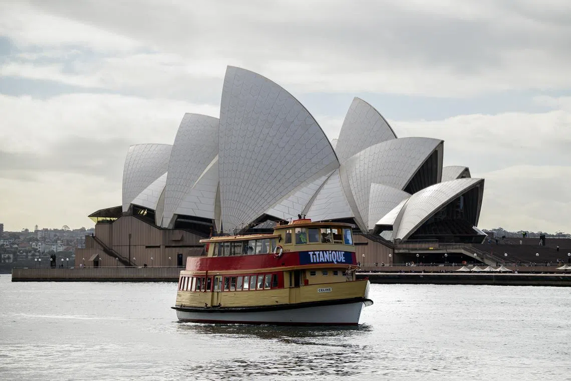 epa11507706 A boat in the Sydney Harbour promotes the Titanique the Musical during a cast announcement where Marney McQueen will play the role of Celine Dion in Sydney, Australia, 30 July 2024. Titanique is a parody of the 1997 film Titanic, and the story retells the movie's events from the perspective of Celine Dion. EPA-EFE/BIANCA DE MARCHI NO ARCHIVING AUSTRALIA AND NEW ZEALAND OUT