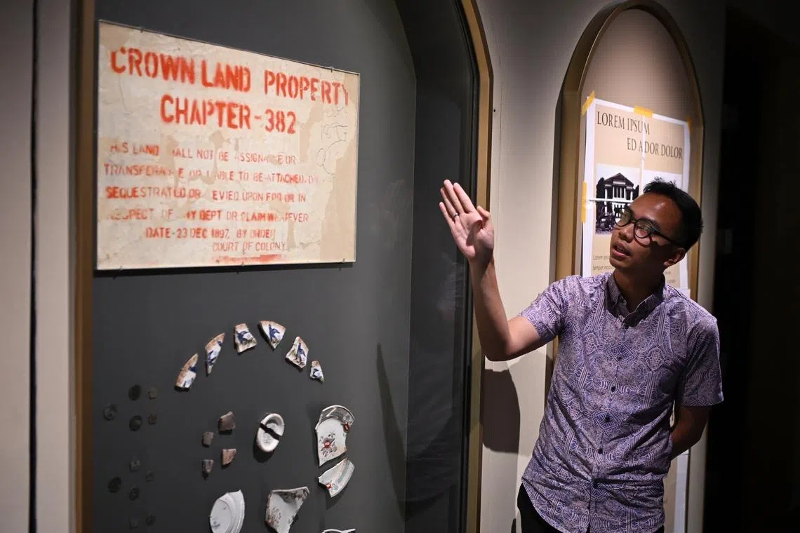 Malay Heritage Centre assistant curator Hadi Osni sharing about a stencilled sign dated 1897 which was uncovered during restoration works for the centre.
