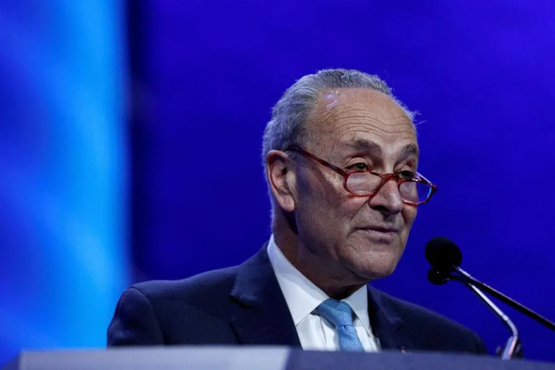 FILE PHOTO: Senate Democratic Leader Chuck Schumer (D-NY) delivers remarks during the AIPAC convention at the Washington Convention Center in Washington, U.S., March 2, 2020.  REUTERS/Tom Brenner/File Photo