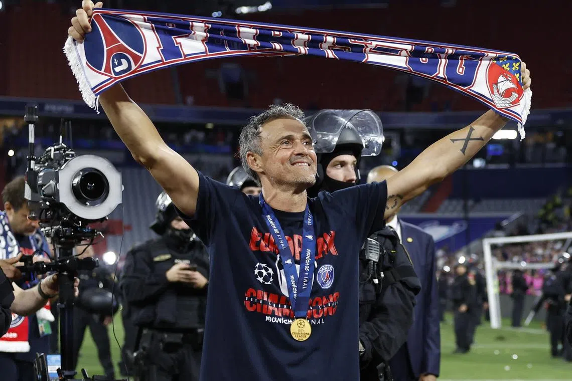 Soccer Football - Champions League - Final - Paris St Germain v Inter Milan - Allianz Arena, Munich, Germany - May 31, 2025 Paris St Germain coach Luis Enrique celebrates after winning the Champions League REUTERS/Peter Cziborra