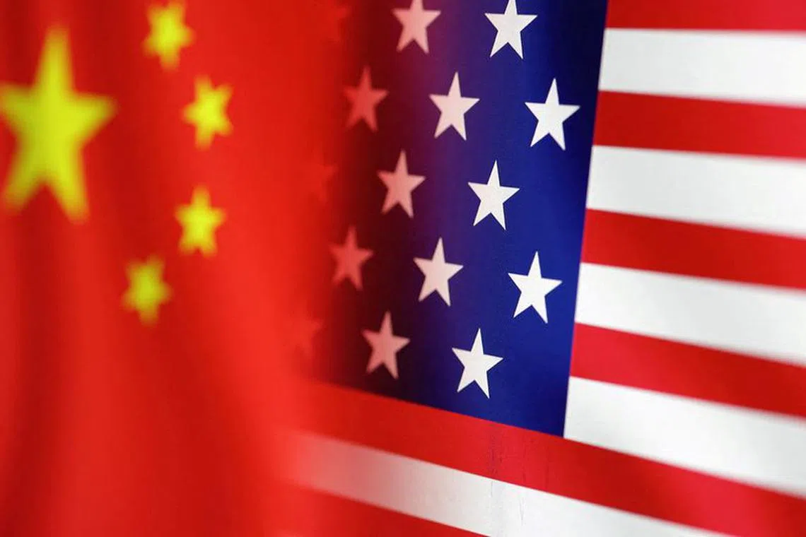 FILE PHOTO: U.S. and Chinese flags are seen in this illustration taken, January 30, 2023. REUTERS/Dado Ruvic/Illustration/File Photo