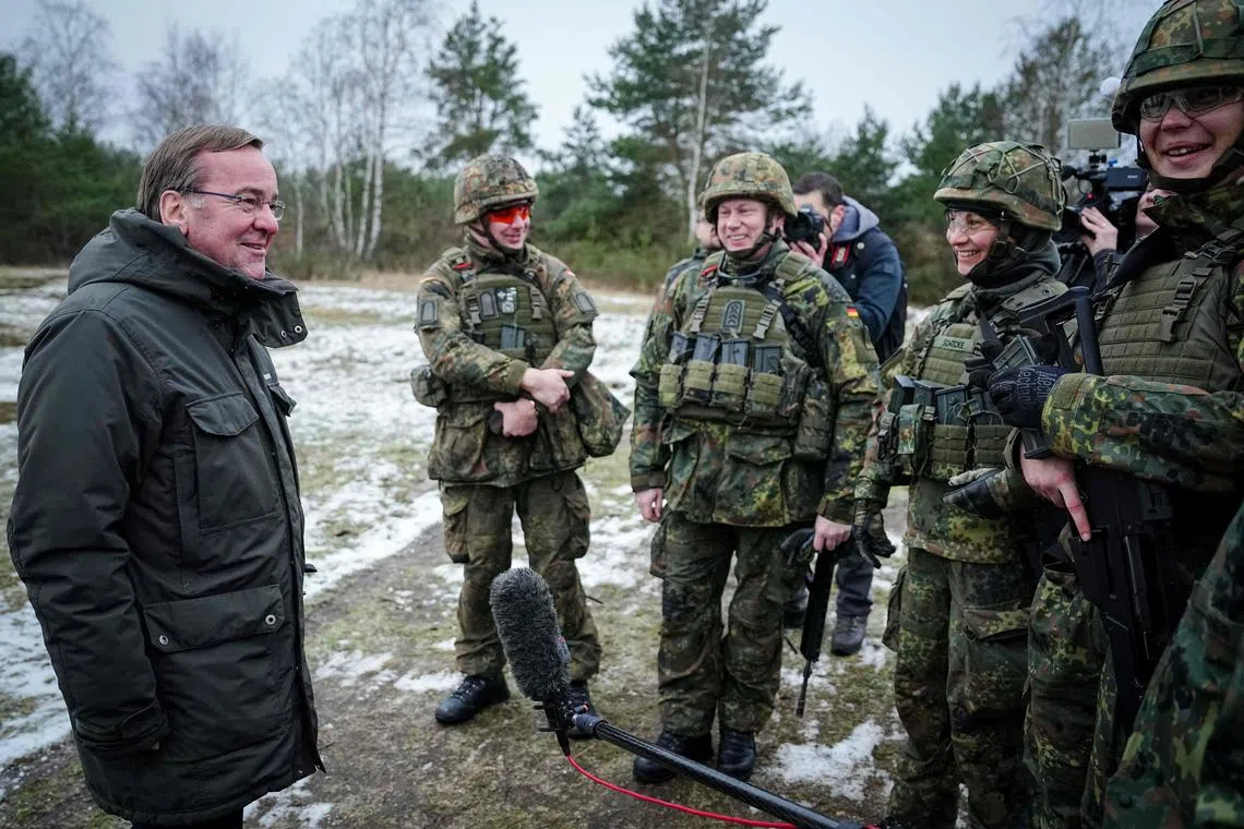 Germany's new defence minister Boris Pistorius (left) visits troops in eastern Germany, on Jan 26, 2023.