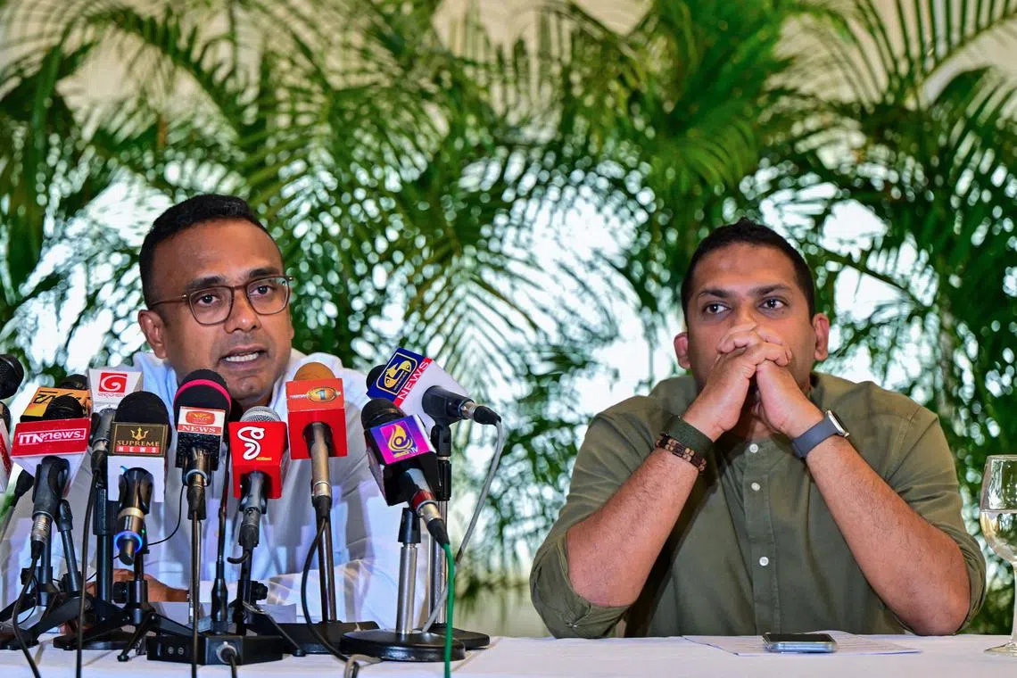 Sri Lanka's tourism minister Harin Fernando and labour minister Manusha Nanayakkara (L) attend a press conference in Colombo on August 9, 2024, shortly after they were sacked over defection. Two government ministers who defected from Sri Lanka's main opposition were removed from the cabinet on August 9, after the Supreme Court upheld disciplinary action against them. (Photo by Ishara S. KODIKARA / AFP)