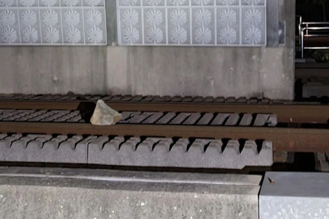 A rail traffic controller noticed the boy trespassing into the restricted railroad area and placing a rock on the railroad. 