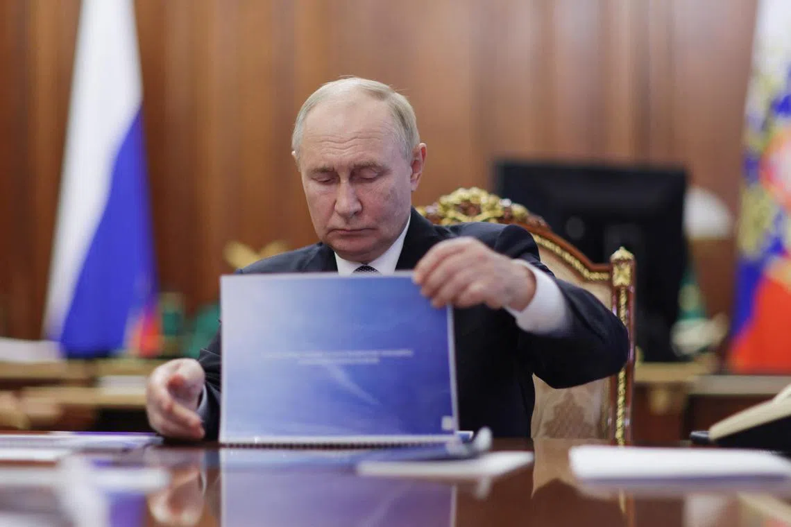 Russian President Vladimir Putin meets head of the North Ossetia–Alania region Sergei Menyailo (not pictured), at the Kremlin, in Moscow, Russia November 11, 2024.  Sputnik/Vyacheslav Prokofyev/Pool via REUTERS ATTENTION EDITORS - THIS IMAGE WAS PROVIDED BY A THIRD PARTY.