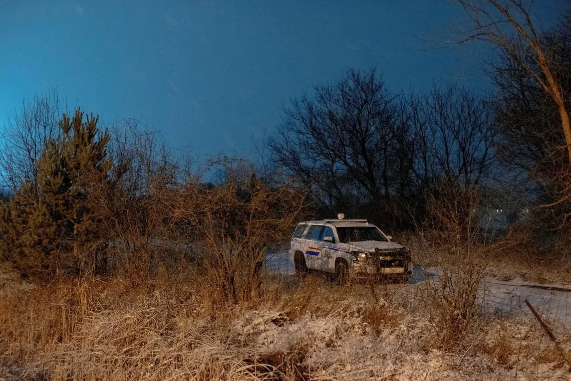 FILE PHOTO: A Royal Canadian Mounted Police (RCMP) vehicle is parked near the Canada-U.S. border during a patrol, in Saint-Georges-de-Clarenceville, Quebec, Canada December 5, 2024.  REUTERS/Carlos Osorio/File Photo