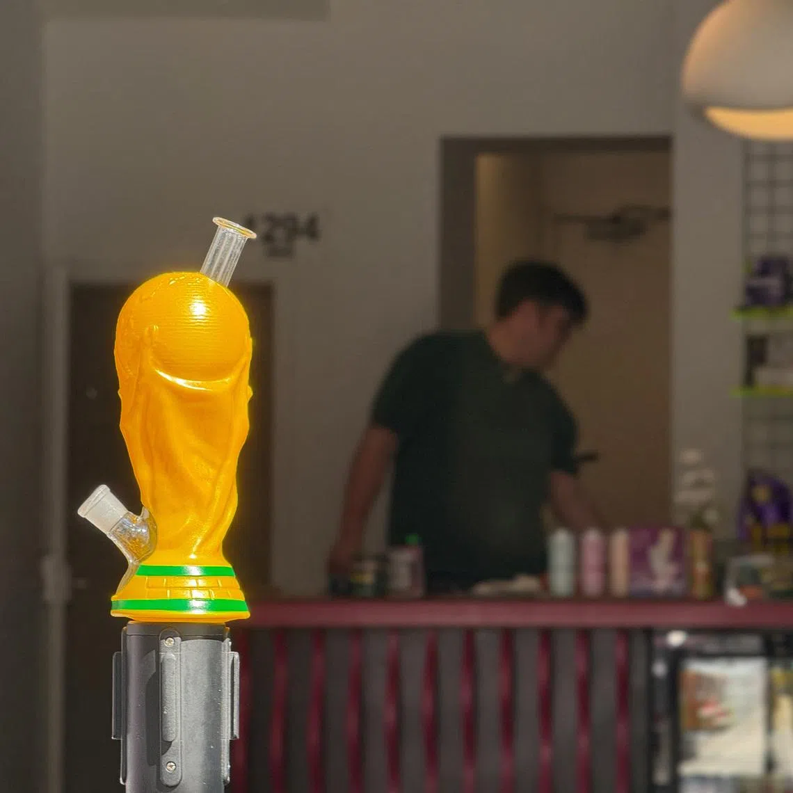 The 'FIFA BONG', which resembles the FIFA World Cup trophy, during the FIFA World Cup 2026, as Sean Kady, 38 owner of Cosmos Charlies, stands in his shop, in Toronto, Ontario, Canada, June 15, 2026. Picture taken with a mobile phone. REUTERS/Divya Rajagopal