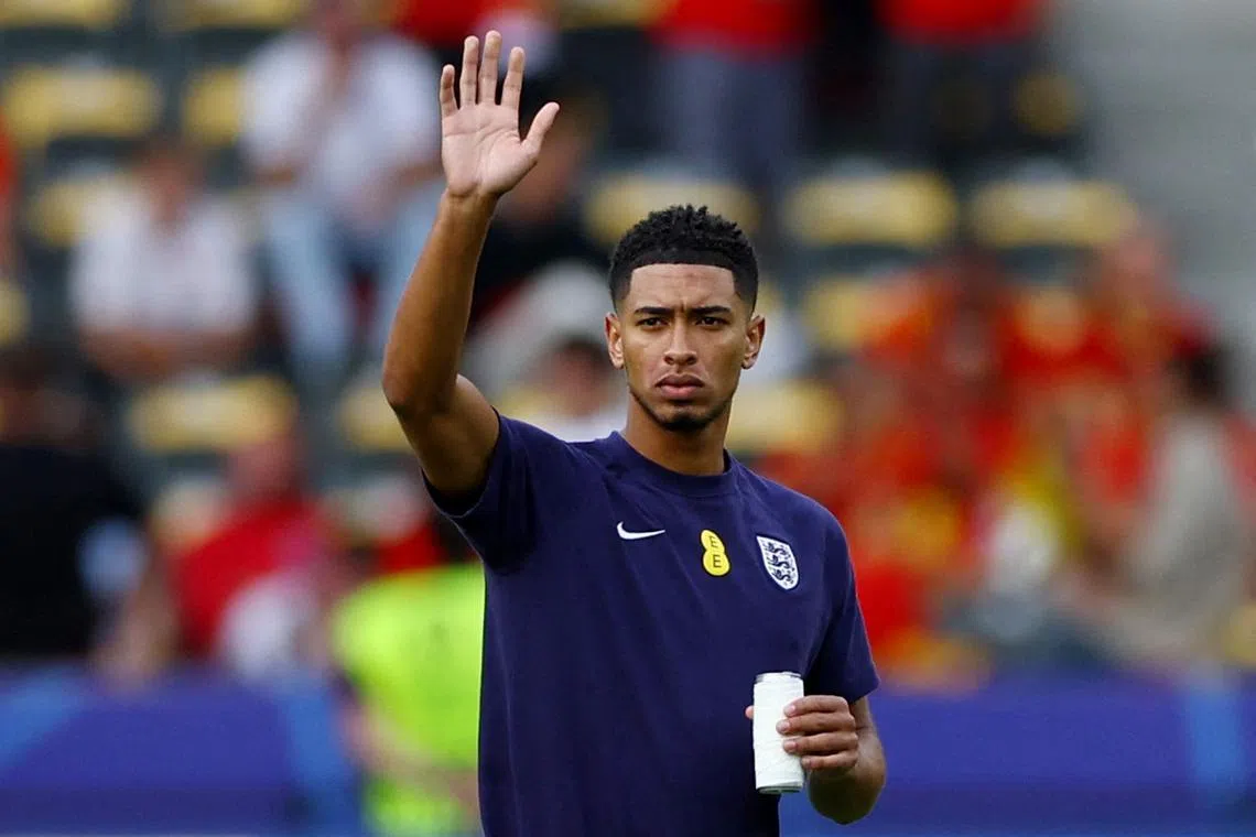 FILE PHOTO: Soccer Football - Euro 2024 - Final - Spain v England - Berlin Olympiastadion, Berlin, Germany - July 14, 2024 England's Jude Bellingham waves on the pitch before the match REUTERS/Lee Smith/File Photo