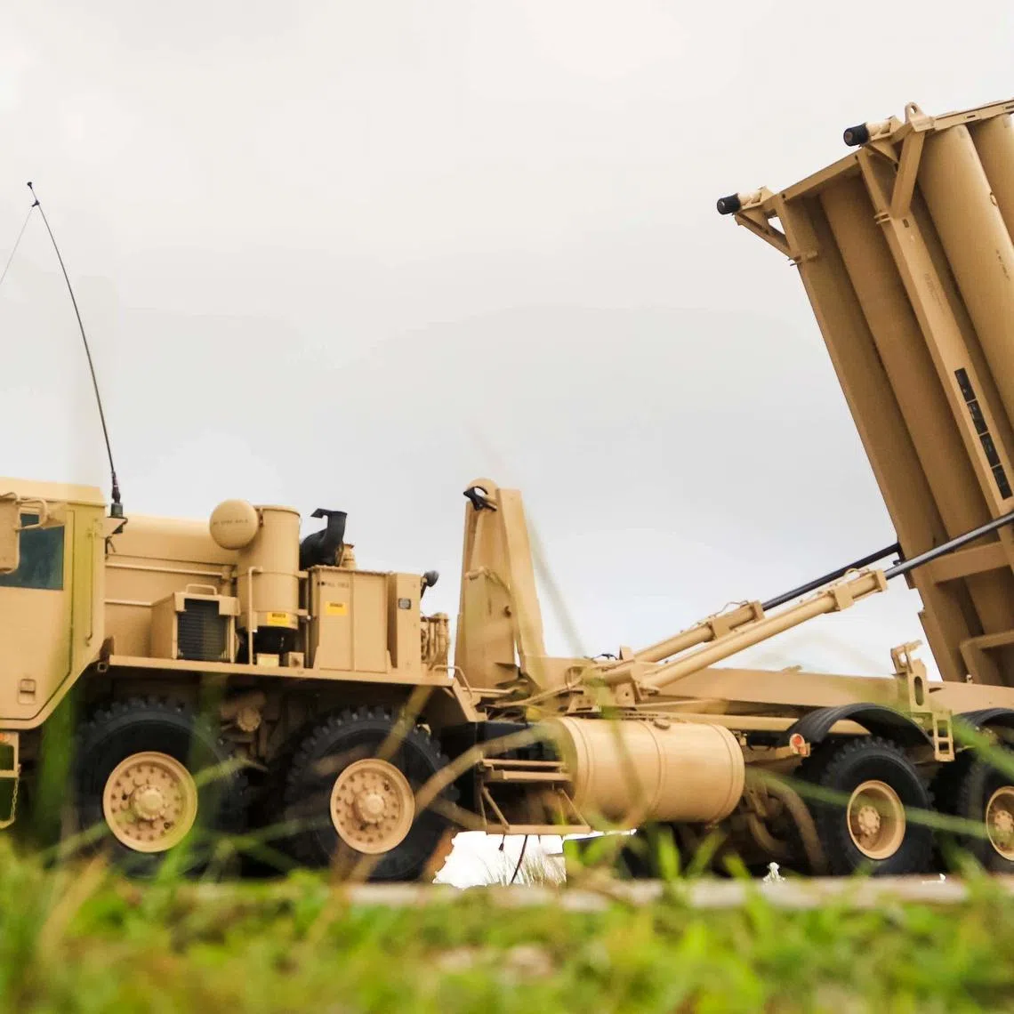 FILE PHOTO: A U.S. Army Terminal High Altitude Area Defense (THAAD) weapon system is seen on Andersen Air Force Base, Guam, October 26, 2017.  U.S. Army/Capt. Adan Cazarez/Handout via REUTERS/File Photo